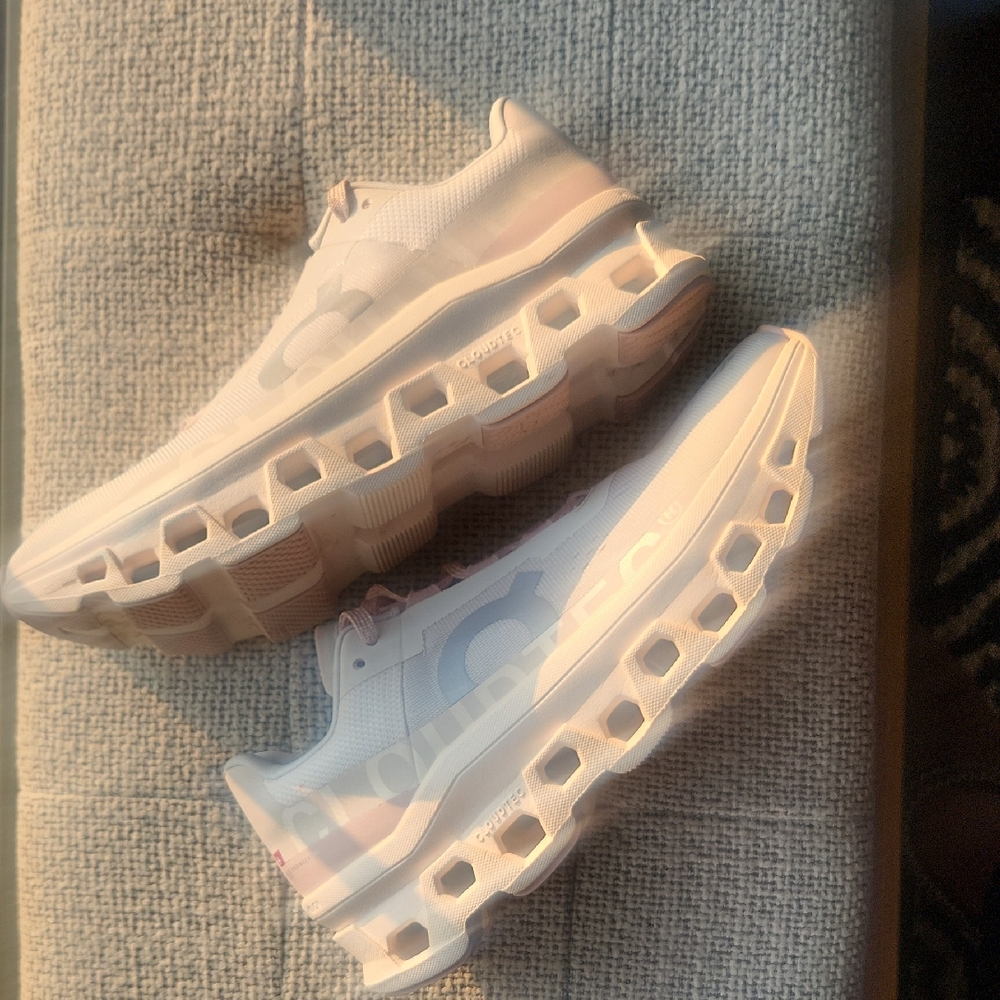 On Running White and Pink Sneakers